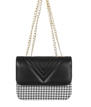 Cross-body bag with black houndstooth chain