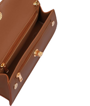 Long tan clutch bag